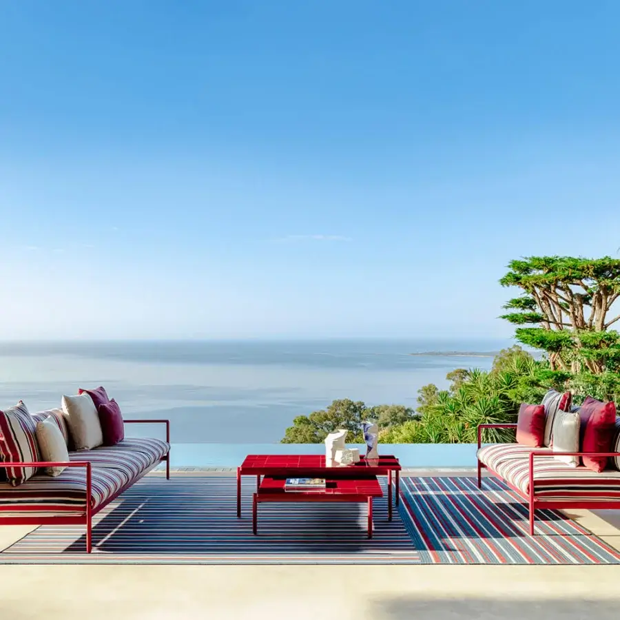 Distinguished Talenti Nalu coffee table crafted in red glazed stoneware with a matching aluminum frame