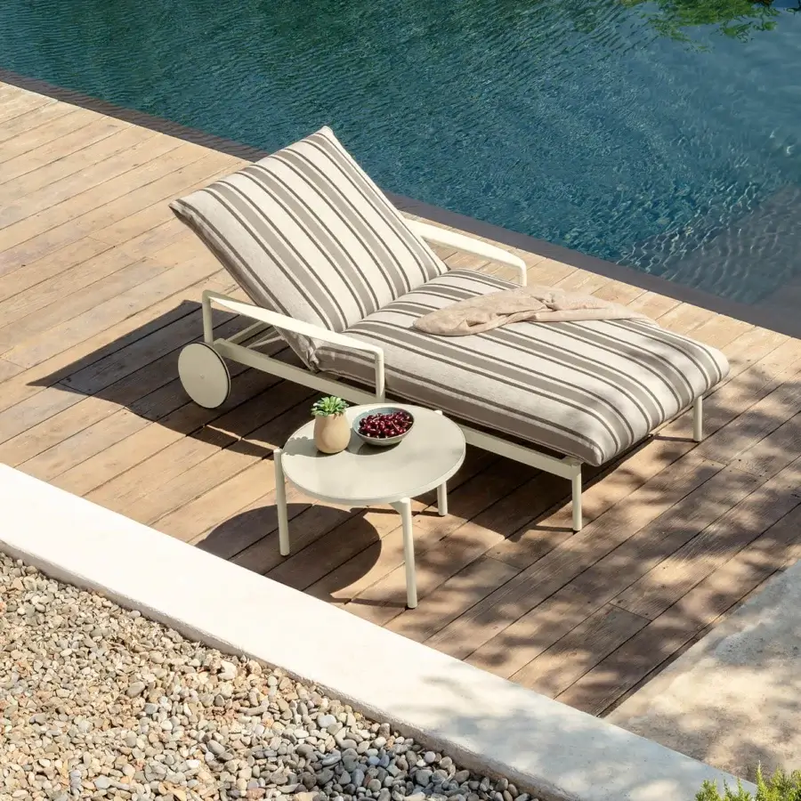 Distinctive Talenti Nalu coffee table with glazed stoneware tabletop and sleek aluminum structure in uniform off-white tone