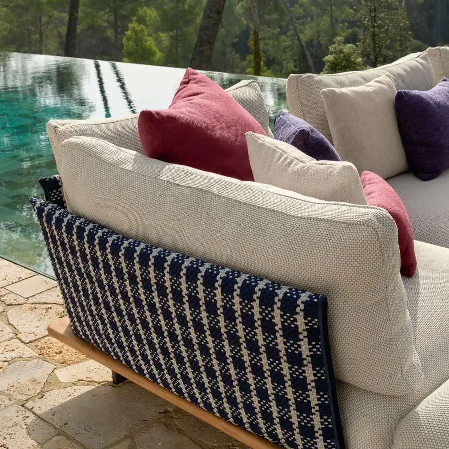 Superior Talenti Venice sectional with teak and accoya wood base upholstered in textured nautical textile with off-white cushions and accent pillows