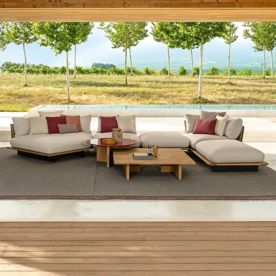 Exceptional Talenti Venice sectional with teak and accoya wood base upholstered in light beige textile with red and blush pink cushions