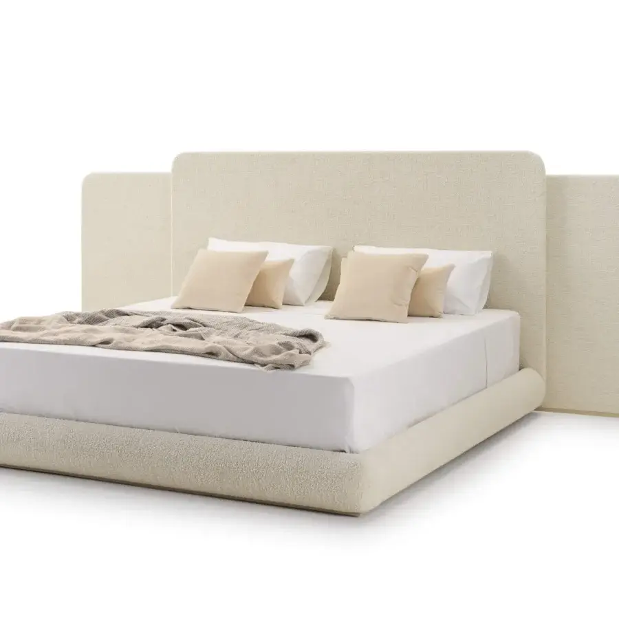 Distinctive Turri Roma bed with light beige bouclé fabric upholstery, wing structure and delicate metal band