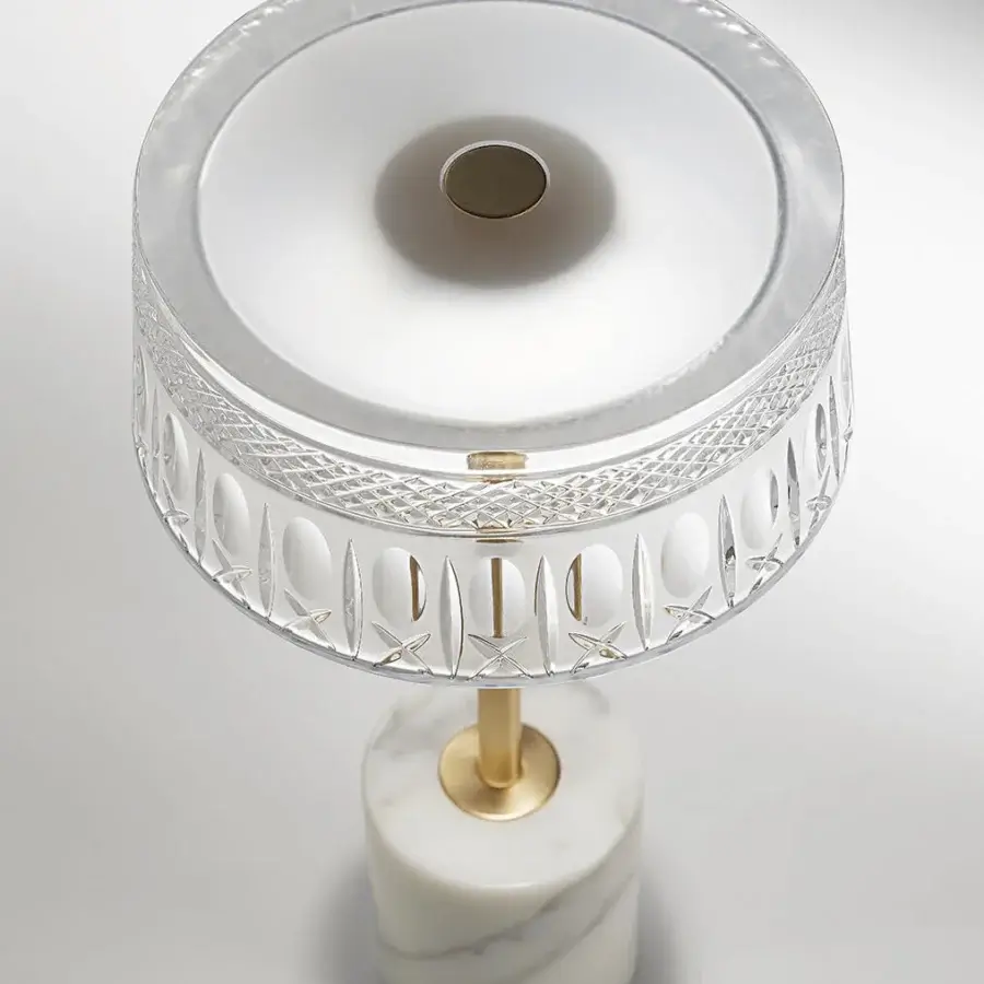 Architectural Italamp Ester table lamp with carved crystal diffuser and refined Calacatta gold marble base crafted in Italy with brushed light gold finish