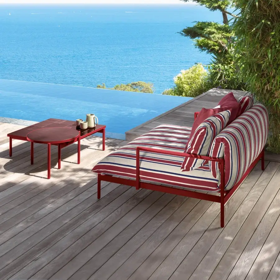 Stunning Talenti Nalu daybed crafted in Italy with painted aluminum and plush fabric cushions in red and striped textiles