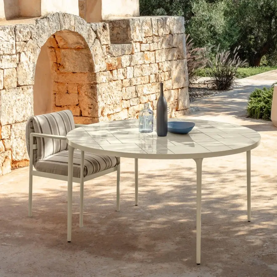 Superior Talenti Nalu table with pale cream ceramic tile tabletop and light-colored metal frame with matte finish