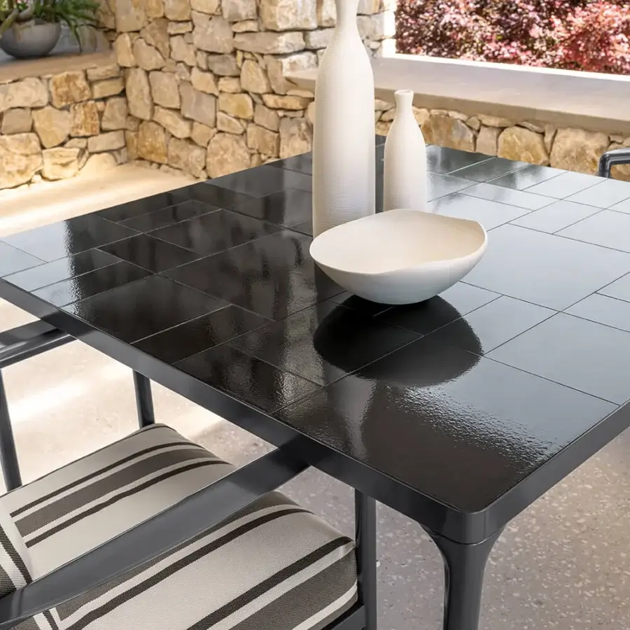 Superior Talenti Nalu table with striking black tiled tabletop and matte metal frame crafted in Italy