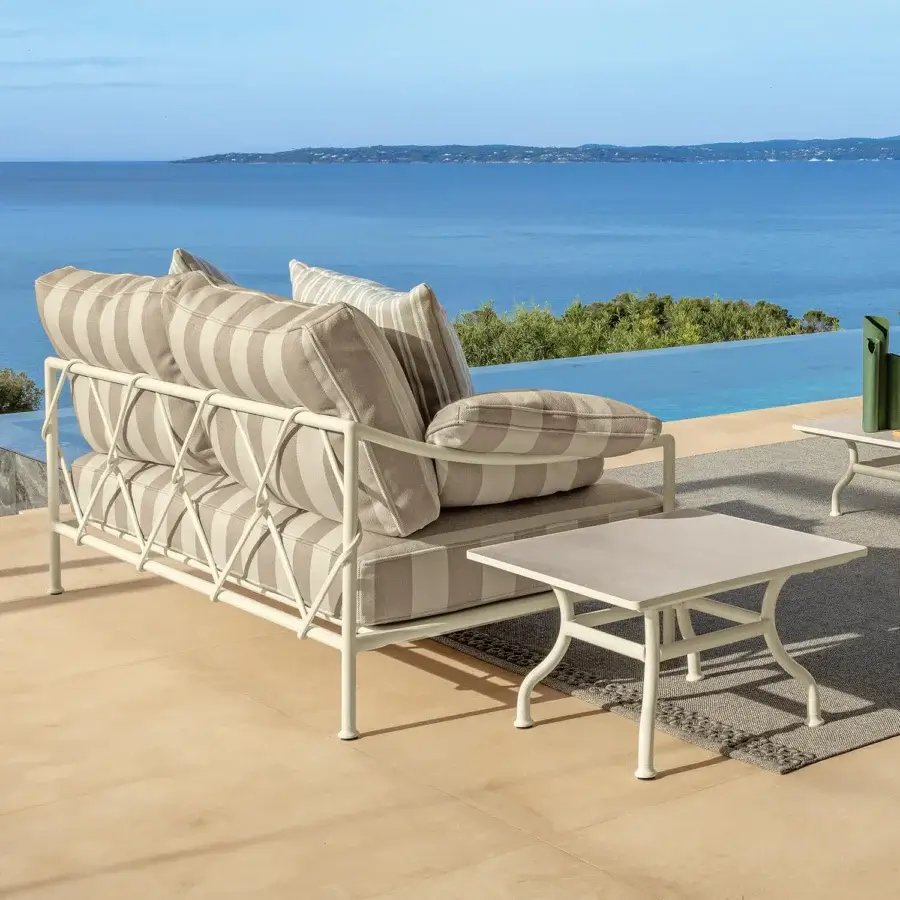 Distinguished Talenti Capri sofa with comfortable cushions upholstered in beige and white striped textile and polished metal frame