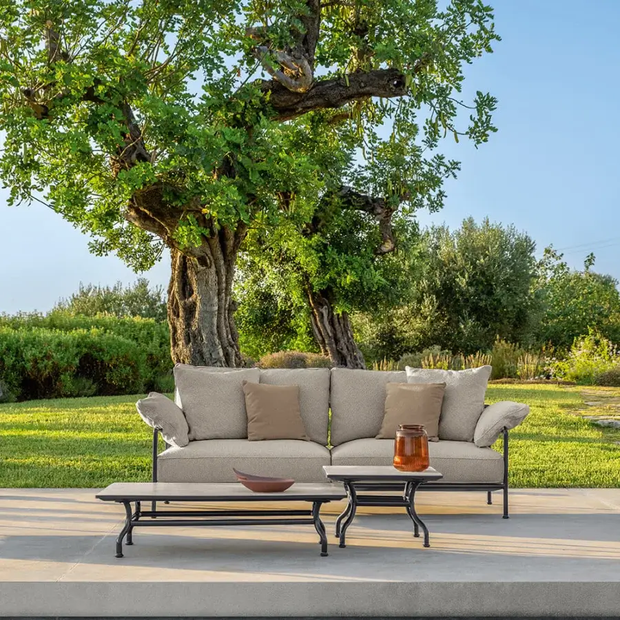 Distinguished Talenti Capri sofa with a polished metal frame and textured neutral beige upholstery for relaxed lounging