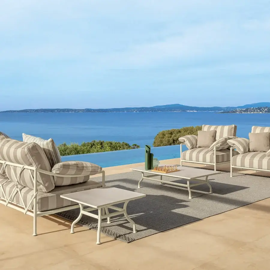 Elegant Talenti Capri coffee & side table with a light ceramic top and sleek metal frame crafted in Italy