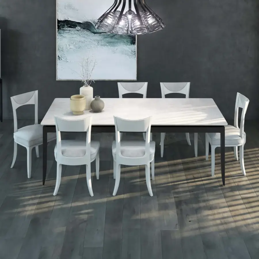 Distinguished BelMondo by Bellotti Ezio Auriga table with light wood and dark metal legs in a textured distressed finish
