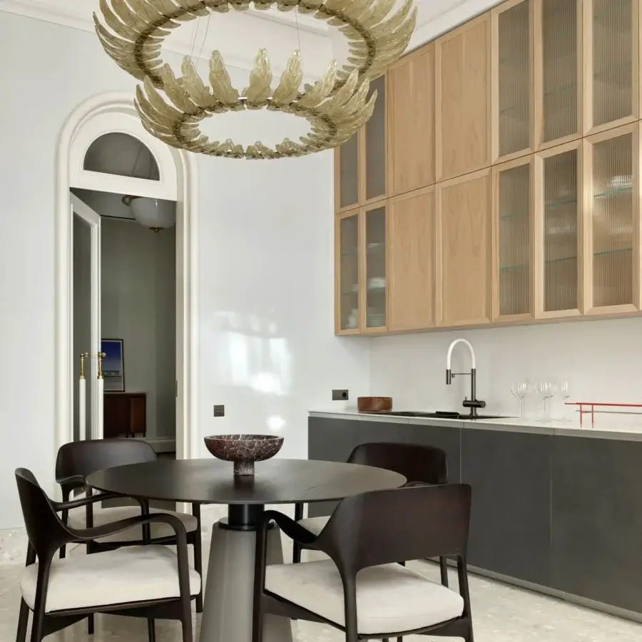 Distinguished Italamp Airone suspension lamp with concentric rings of translucent glass leaves in warm gold tone built with stainless steel cables