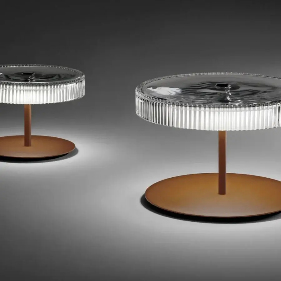 Elegant Italamp Gilda table lamp with hand-carved transparent glass diffuser and corten metal details