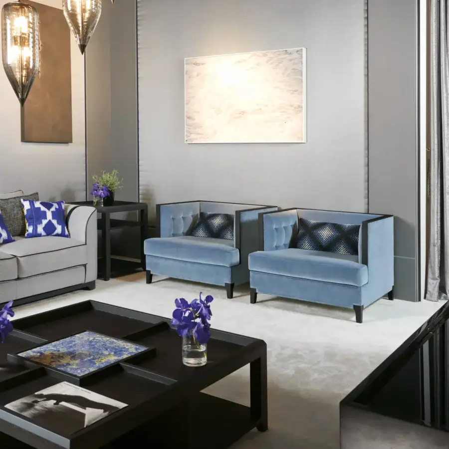 Distinguished BelMondo by Bellotti Ezio Attesa lounge chair with light blue textile upholstery and dark-finished wood frame built with tufted detailing
