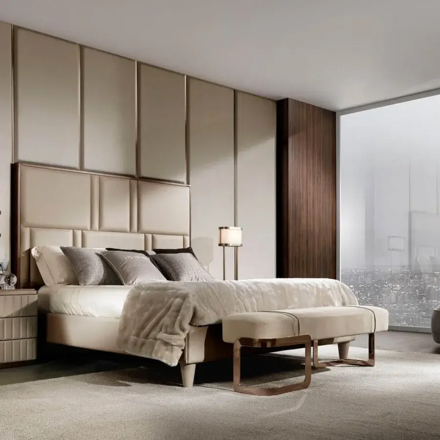 Exclusive DV Home Collection Elite bed built with multilayer structure upholstered in light beige textile with antique bronze steel frame insert and bench