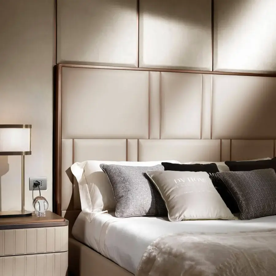 Lavish DV Home Collection Elite bed with light beige textile upholstery and bronze steel framed headboard