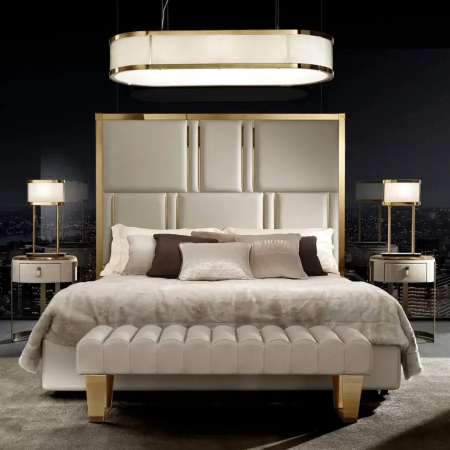 Elite DV Home Collection bed with light beige textile upholstery and a refined gold steel frame insert
