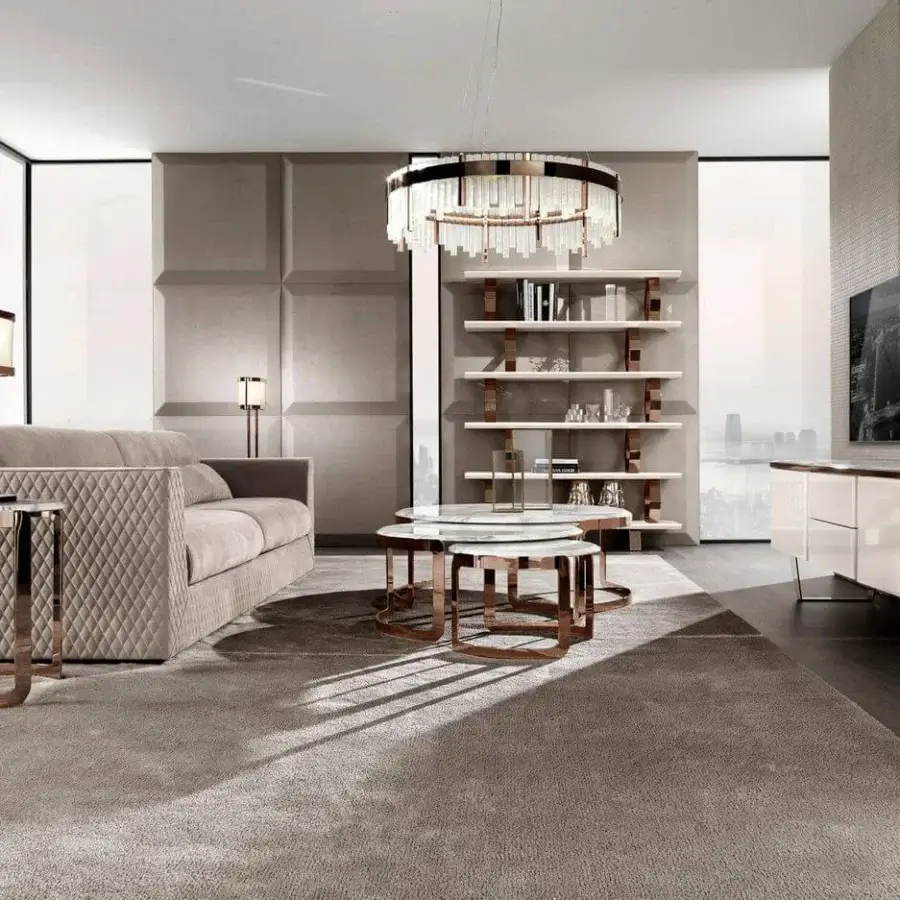 Sophisticated DV Home Collection Coco coffee table with Frappuccino marble top and glossy copper finish