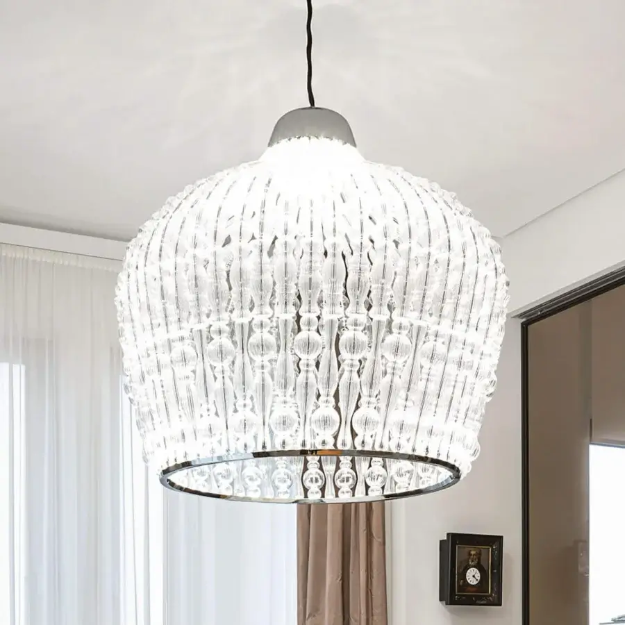 Elegant Italamp Crowns suspension lamp with chrome metal and delicate transparent blown glass elements creating diffused illumination