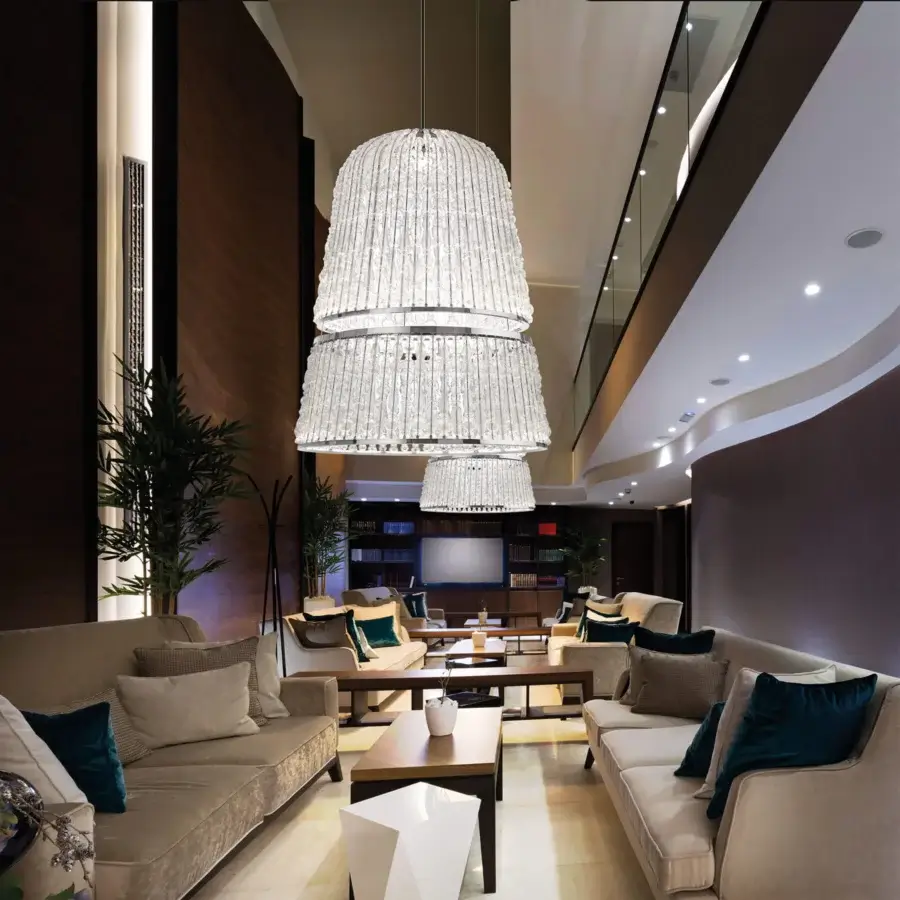 Captivating Italamp Crowns suspension lamp with chrome metal and delicate transparent blown glass elements exhibiting a textured clear finish
