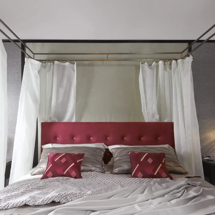 Captivating BelMondo by Bellotti Ezio Levante canopy bed with red upholstery and sheer white textiles in a matte finish