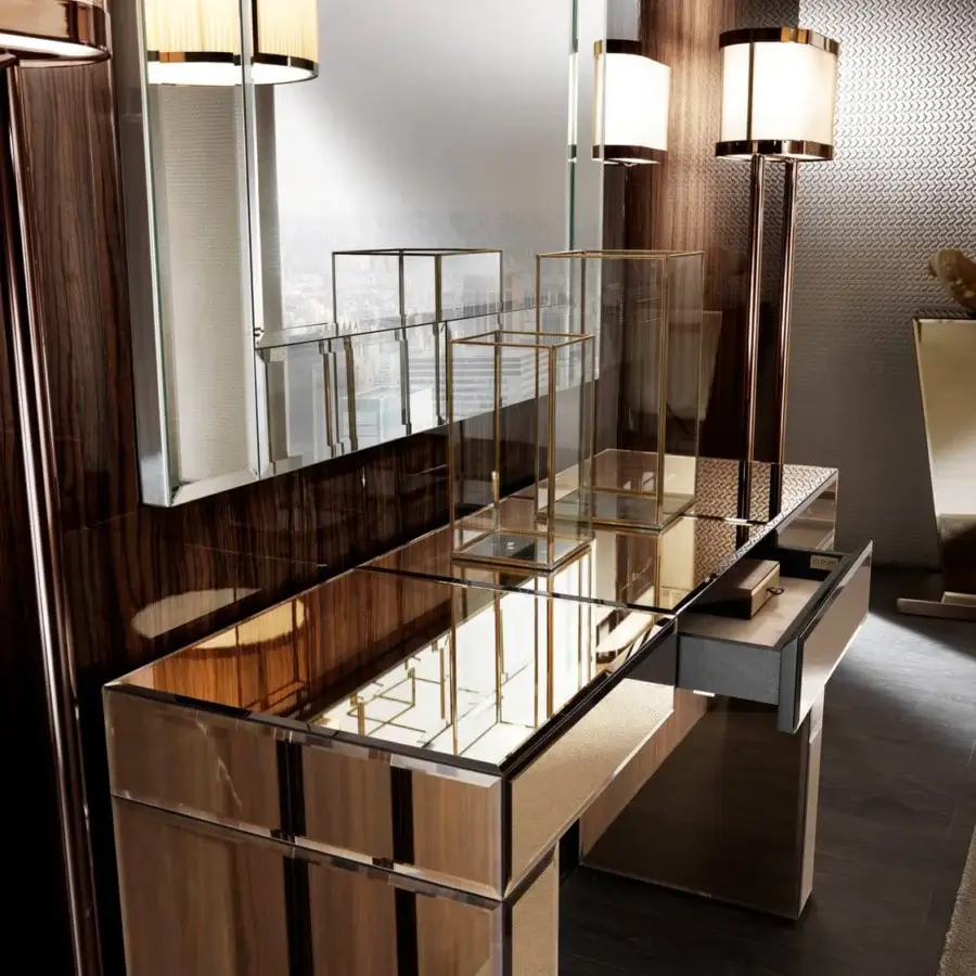 Exceptional DV Home Collection Envy console built with bevelled natural mirror and a warm reflective surface
