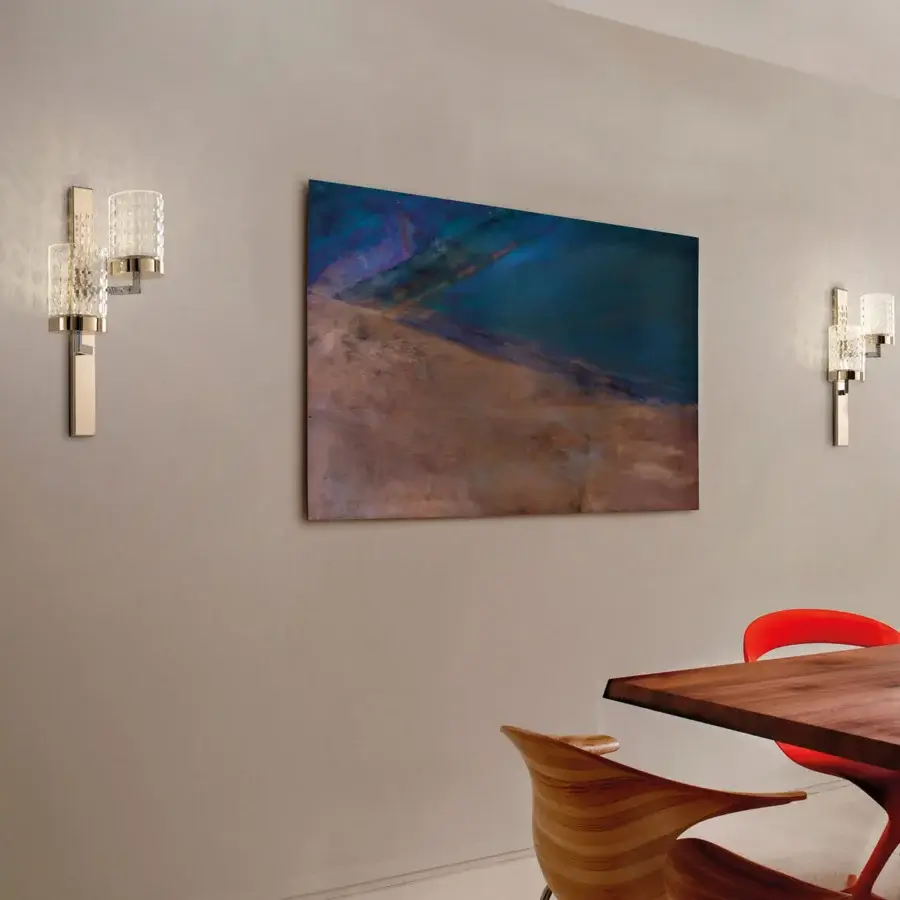 Superior Italamp Quarzo wall lamp with refined metal structure and hand-cut transparent crystal diffusers in light gold and chrome finish
