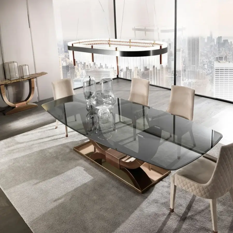 Elegant DV Home Collection Hermes console with shining lacquered marble and sleek bronze-toned stainless steel base