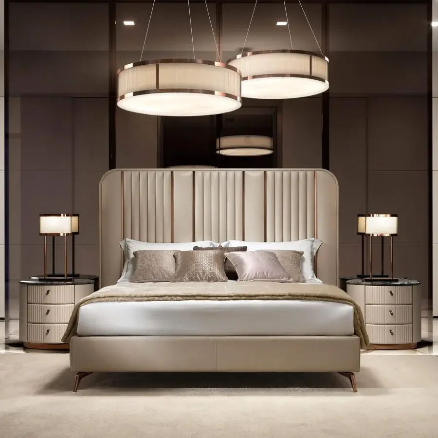Distinguished DV Home Collection Hollywood bed with light cream textile upholstery and refined steel inserts in copper or bronze tone accents