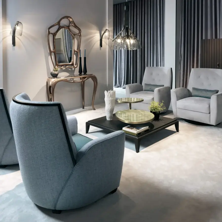 Captivating BelMondo by Bellotti Ezio Medita lounge chair with soft blue-grey textile and dark trim defining its curved form