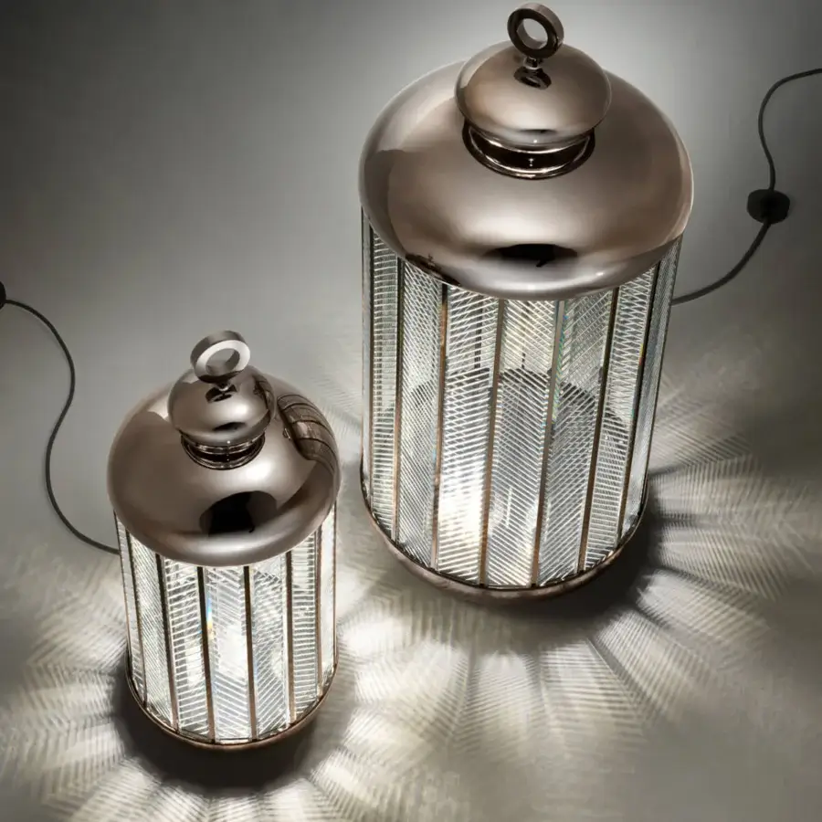 Elegant Italamp Fata Morgana floor lamp with cylindrical hand-carved glass encased in bronze-toned metal with antique burnished finish