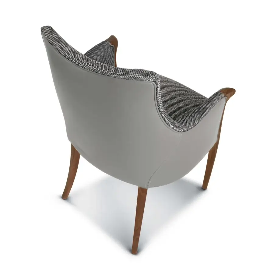 Exceptional Bellotti Ezio Demetra armchair with light gray leather shell and woven black and white textile accents built with stained wooden legs