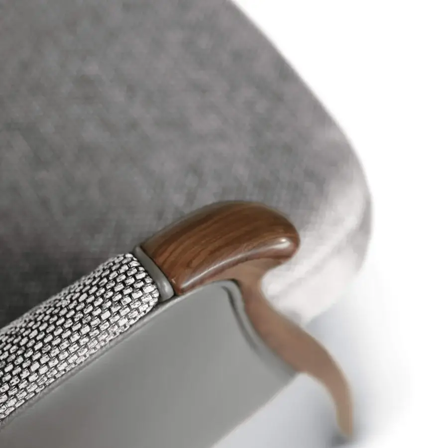 Handcrafted Bellotti Ezio Demetra armchair with woven textile and sleek gray synthetic material, showcasing a warm brown wooden armrest finish