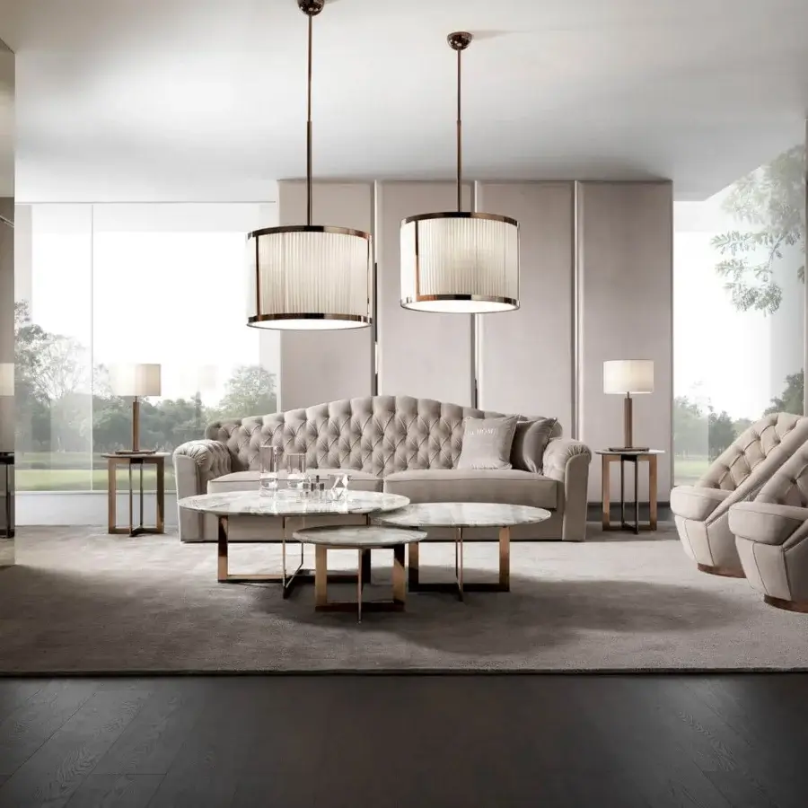 Exclusive DV Home Collection Royal Capitonne' lounge chair with light beige textile and tufted backrest built upon a round swivel steel base