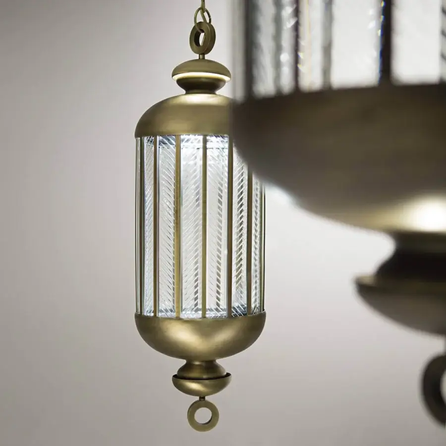 Refined Italamp Fata Morgana suspension lamp with transparent hand-carved glass and bronze-toned metal in antique burnished finish