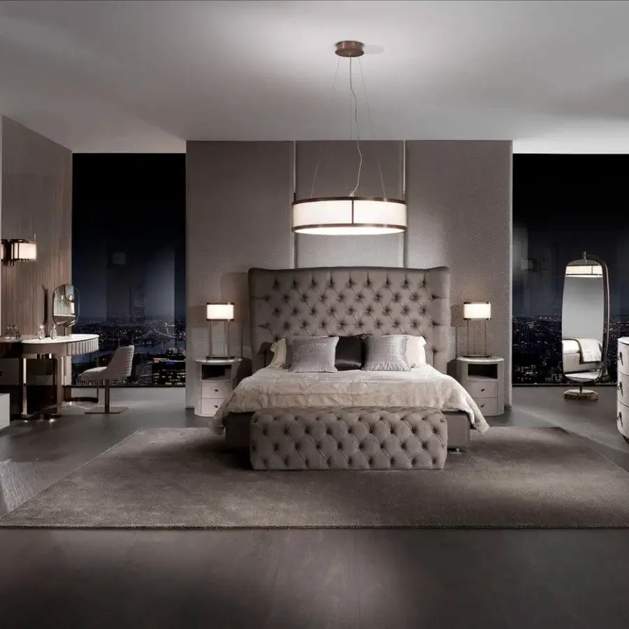 Elegant DV Home Collection Adler Plus nightstand with curved forms and smooth leather in light grey, complemented by beveled mirror or marble