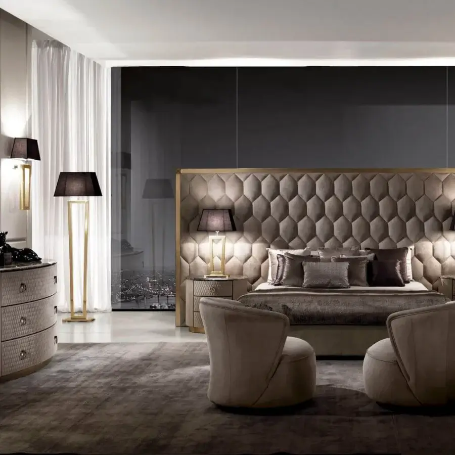 Exclusive DV Home Collection Charlotte dresser with light beige textile and hexagon quilting, complemented by a dark stone top and metallic base
