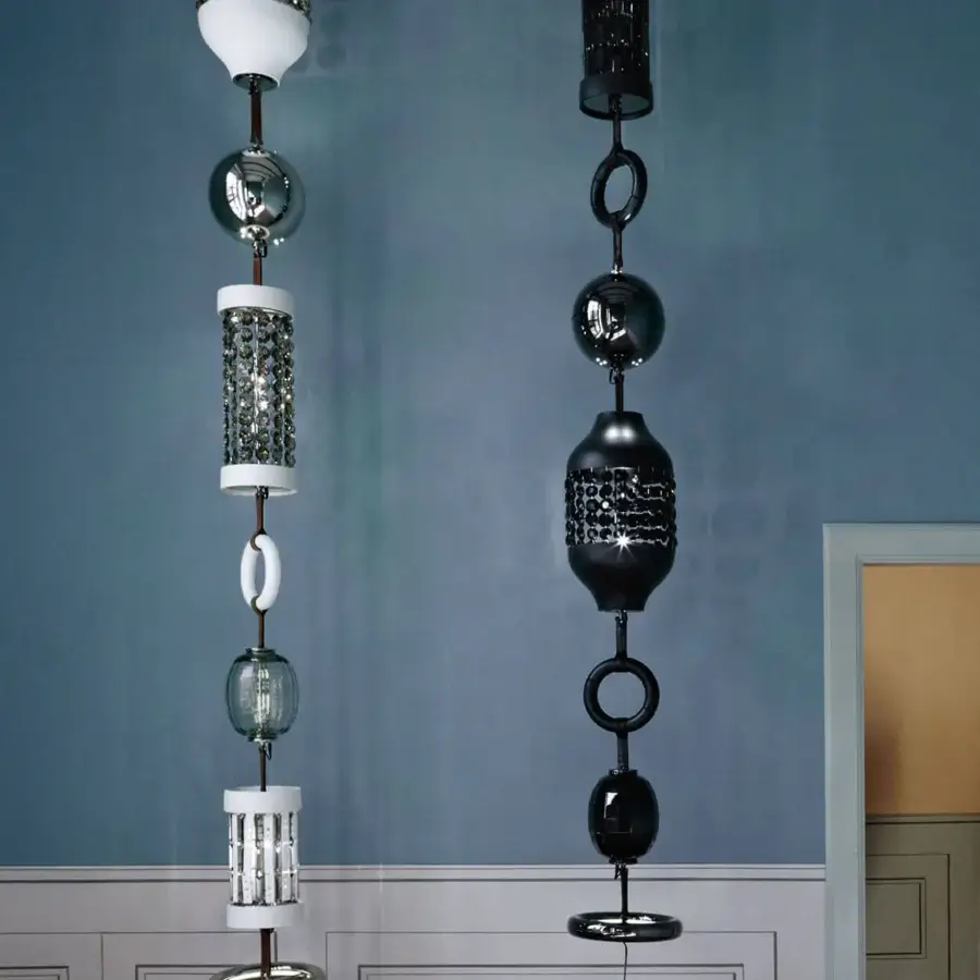Distinguished Italamp Odette Odile suspension lamp with alternating white and silver-toned metal crafted with delicate crystal and luxurious leather details