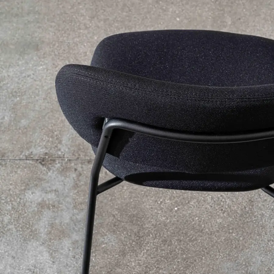 Superior Sovet Italia Soft chair with lacquered metal structure and black textile upholstery exhibiting a matte finish