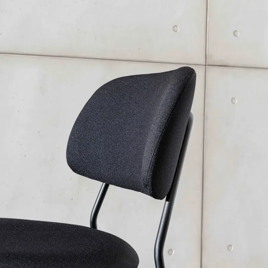 Exceptional Sovet Italia Soft chair with lacquered metal and curved multi-layered wood upholstered in black textile with a matte finish