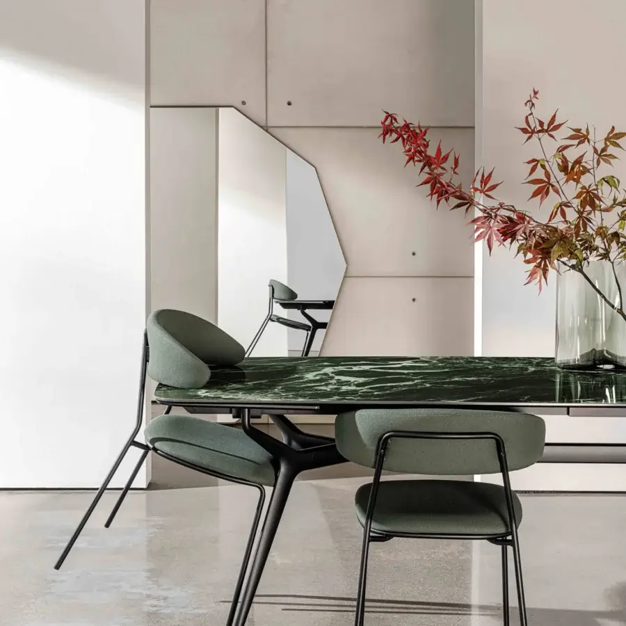 Exceptional Sovet Italia Soft chair with lacquered black metal, golden accents and muted green textile upholstery with a matte finish