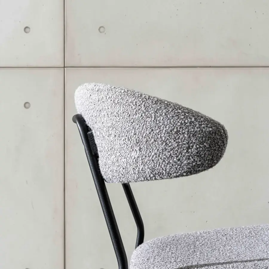 Distinguished Sovet Italia Soft Low chair with lacquered black metal structure and textured gray textile upholstery crafted in Italy