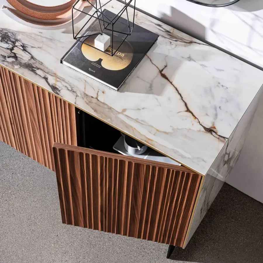 Distinguished Sovet Italia Kala sideboard with vertically-grooved brown wood, sleek marble, brass accents and adjustable smoked glass shelving