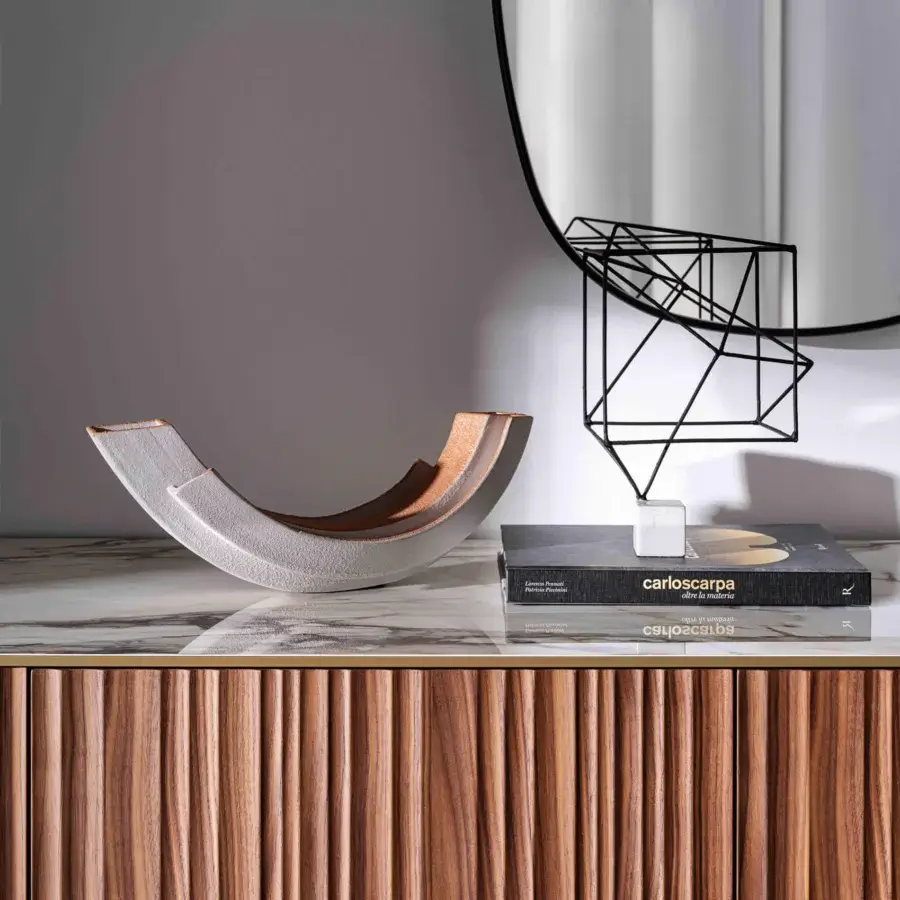 Superior Sovet Italia Kala sideboard with warm brown wood, brass profile and stone-like top showcasing a textured finish