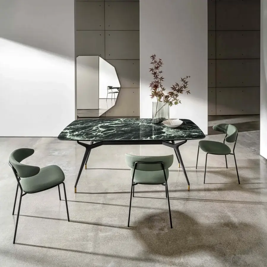 Sophisticated Sovet Italia Arkos shaped extendable table with dark marble-like tempered glass and lacquered aluminum base featuring a glossy finish