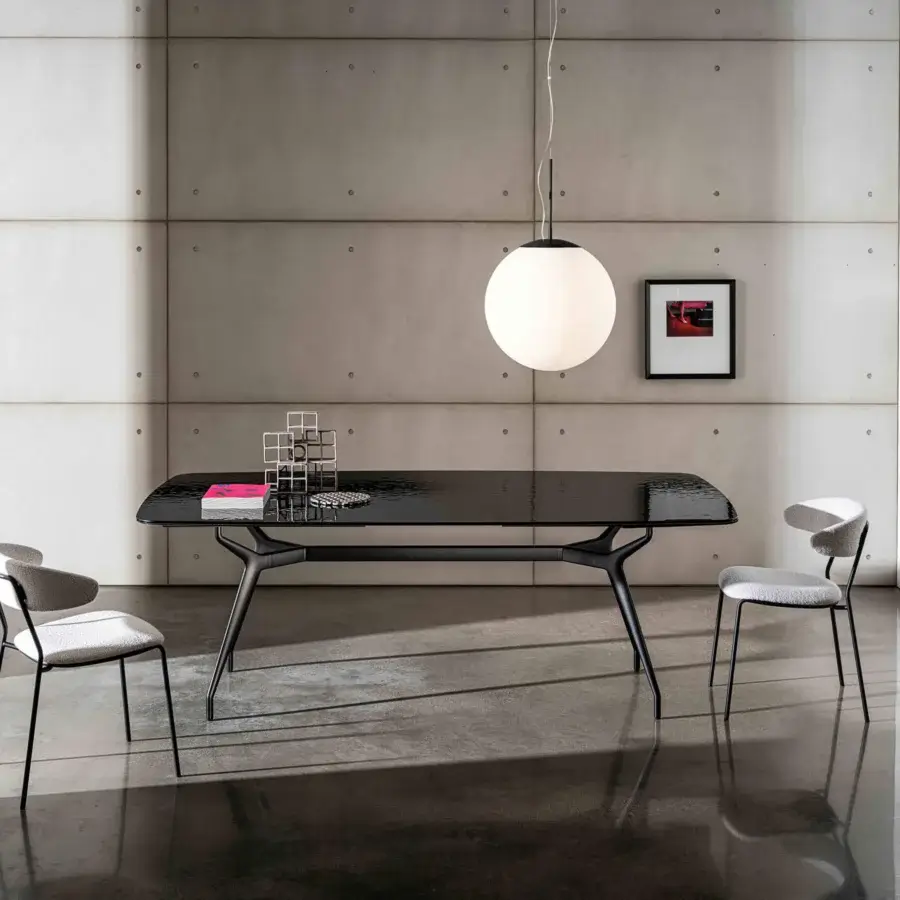Exceptional Sovet Italia Arkos table with glossy black tempered glass and angled black lacquered aluminum legs