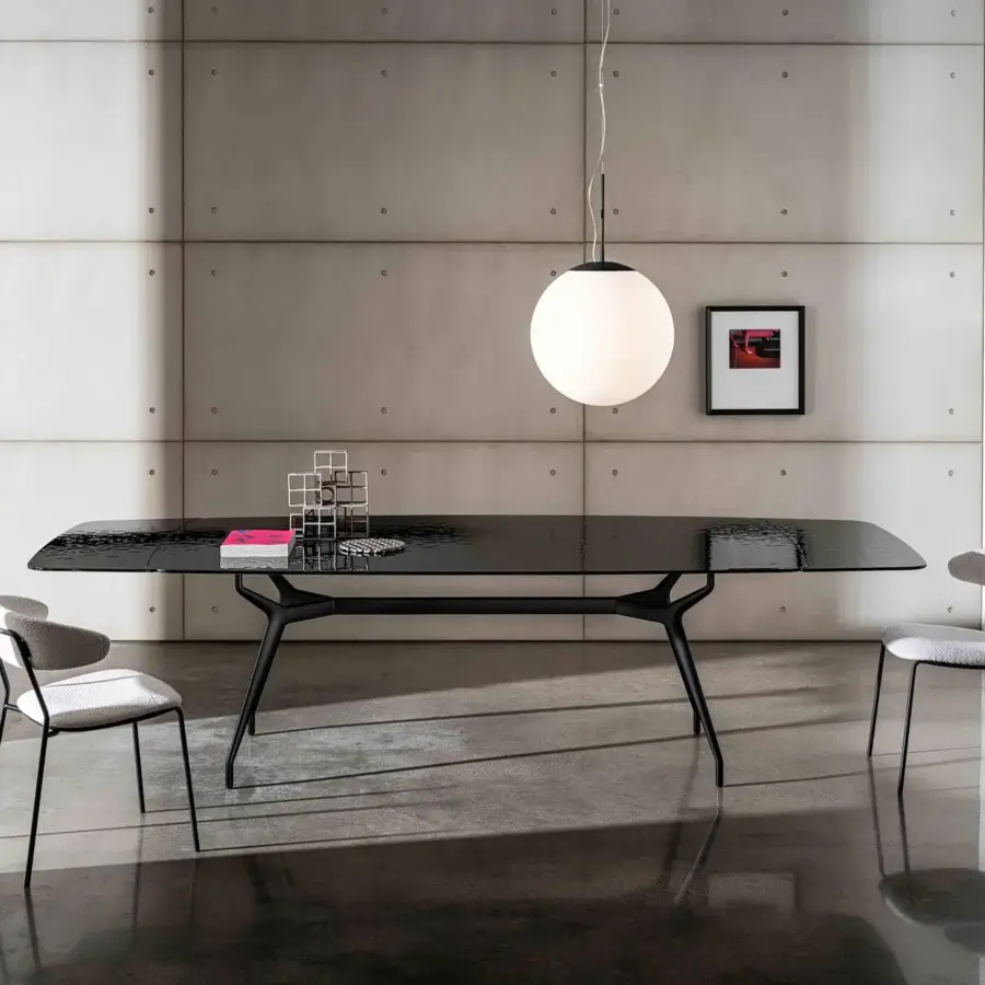Distinguished Sovet Italia Arkos table with glossy black tempered glass and lacquered extensible structure built with matte black aluminum legs
