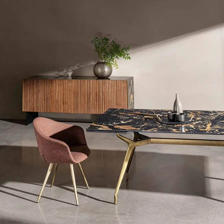 Sophisticated Sovet Italia Arkos table with glossy black and gold tempered glass and lacquered gold aluminum legs