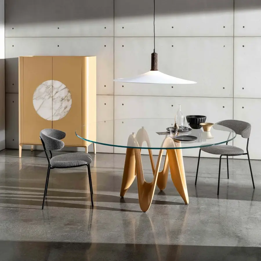 Distinguished Sovet Italia Lambda round table with solid Canaletto walnut wood base and tempered glass top in glossy beige finish