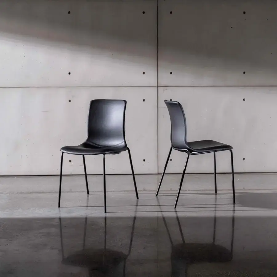 Superior Sovet Italia Olly chair in black with a smooth matte finish and curved backrest built with a metal base