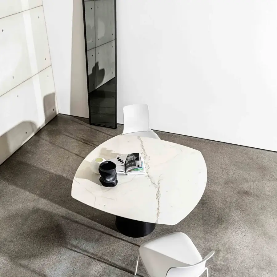 Distinguished Sovet Italia Olly chair with smooth white synthetic material and slender white metal legs