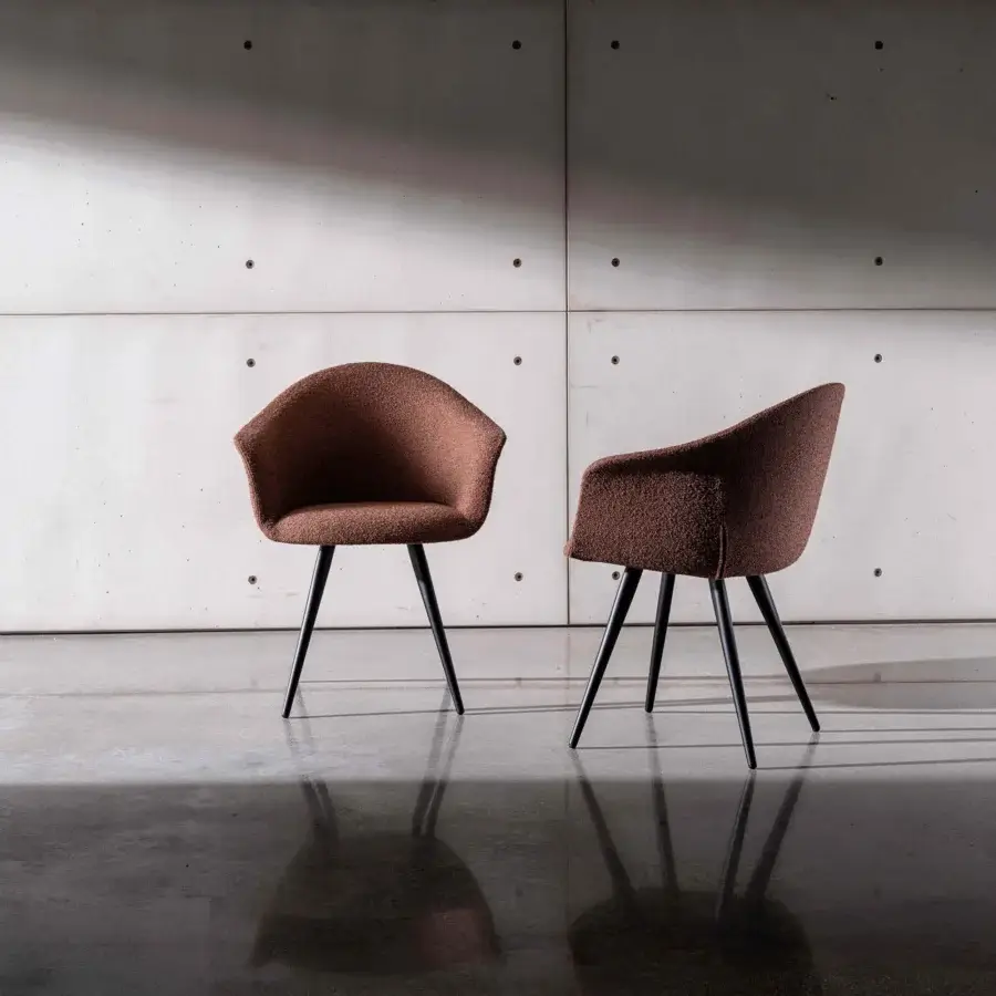 Superior Sovet Italia Dama chair with warm brown textured textile upholstery and slender dark matte metal legs